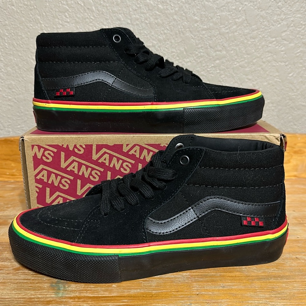 Vans Black Sneakers with Red, Yellow, and Green Accents